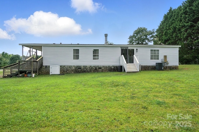1778 N Ingleside Farm Rd, Iron Station, NC 28080 - rear view of property with stairway, a lawn, entry steps, and crawl space