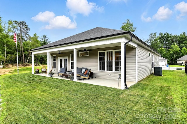 255 Eagles Lndg, Morganton, NC 28655 - rear view of property featuring ceiling fan, an outdoor living space, a lawn, a patio area, and a shingled roof