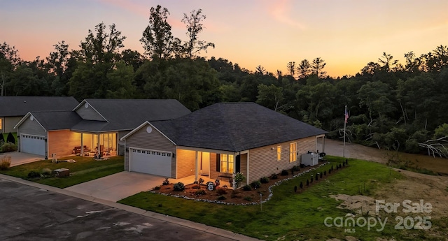 255 Eagles Lndg, Morganton, NC 28655 - view of front of home with driveway, a front lawn, and an attached garage