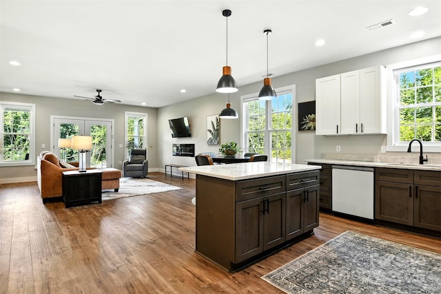 255 Eagles Lndg, Morganton, NC 28655 - kitchen featuring plenty of natural light, dark wood finished floors, open floor plan, white cabinets, and recessed lighting