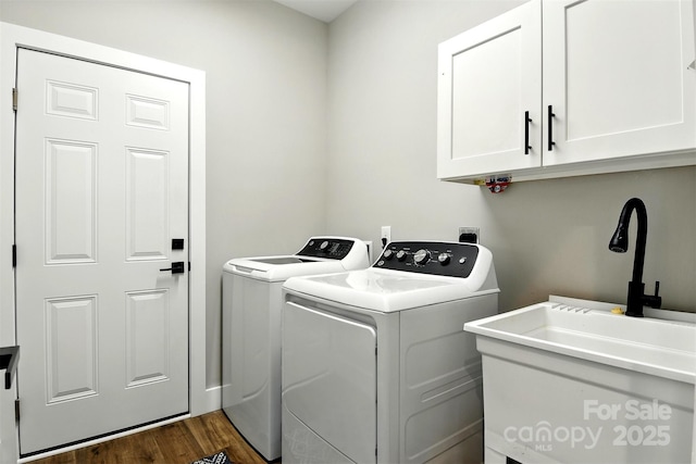 255 Eagles Lndg, Morganton, NC 28655 - laundry area featuring cabinet space, washer and clothes dryer, and dark wood-style flooring