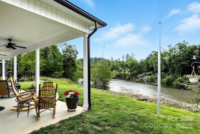 255 Eagles Lndg, Morganton, NC 28655 - view of yard featuring ceiling fan, a water view, and a patio area