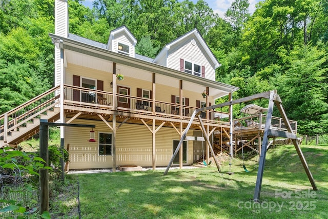 222 Fox Creek Rd, Mars Hill, NC 28754 - rear view of house with stairway, a chimney, a wooden deck, and a yard