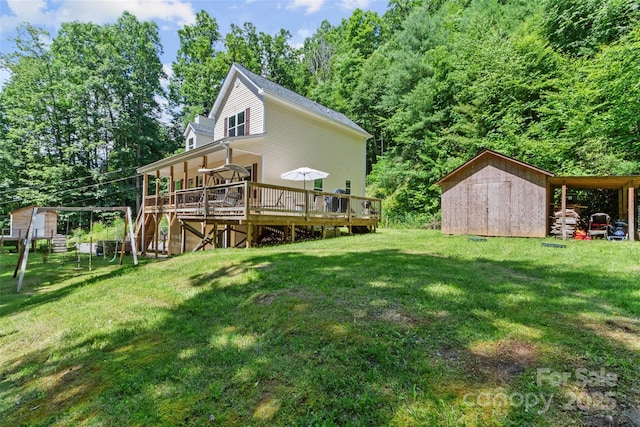 222 Fox Creek Rd, Mars Hill, NC 28754 - back of house with a deck, a shed, and a lawn