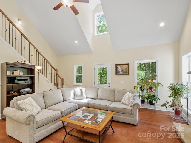 222 Fox Creek Rd, Mars Hill, NC 28754 - living area featuring high vaulted ceiling, stairway, a ceiling fan, and wood finished floors