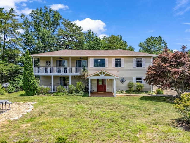 198 Sugarbush Pt, Lake Lure, NC 28746 - colonial inspired home with ceiling fan, a front yard, and a balcony