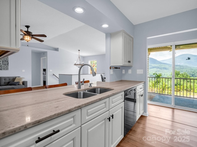 198 Sugarbush Pt, Lake Lure, NC 28746 - kitchen with dishwasher, white cabinetry, light stone countertops, light wood-style floors, and recessed lighting