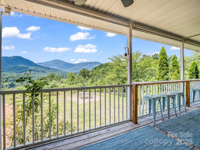 198 Sugarbush Pt, Lake Lure, NC 28746 - deck with a ceiling fan and a mountain view