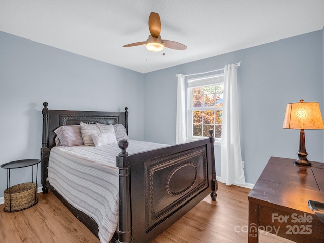198 Sugarbush Pt, Lake Lure, NC 28746 - bedroom with wood finished floors and ceiling fan