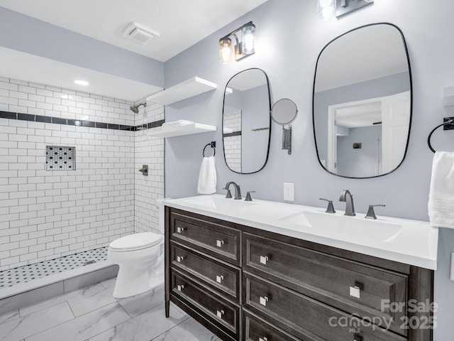 198 Sugarbush Pt, Lake Lure, NC 28746 - full bath featuring double vanity, a tile shower, and marble look tiles