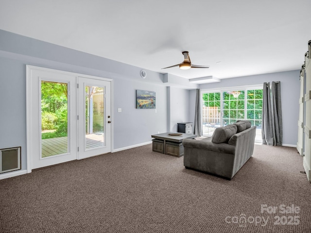 198 Sugarbush Pt, Lake Lure, NC 28746 - carpeted living area with baseboards and a ceiling fan