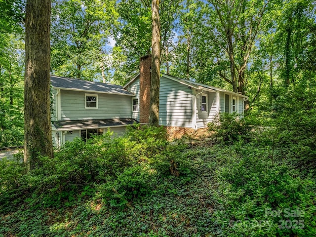 1463 Carolina Dr, Tryon, NC 28782 - view of side of property featuring a chimney