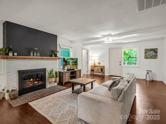 1463 Carolina Dr, Tryon, NC 28782 - living room with dark wood finished floors and a fireplace
