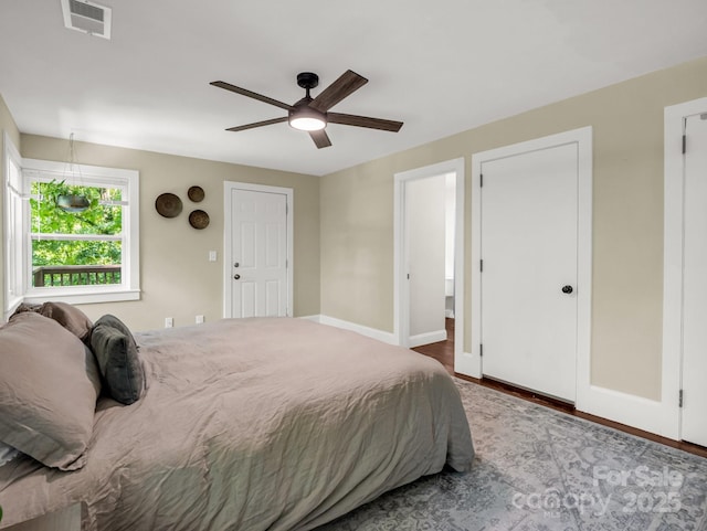 1463 Carolina Dr, Tryon, NC 28782 - bedroom featuring ceiling fan and wood finished floors