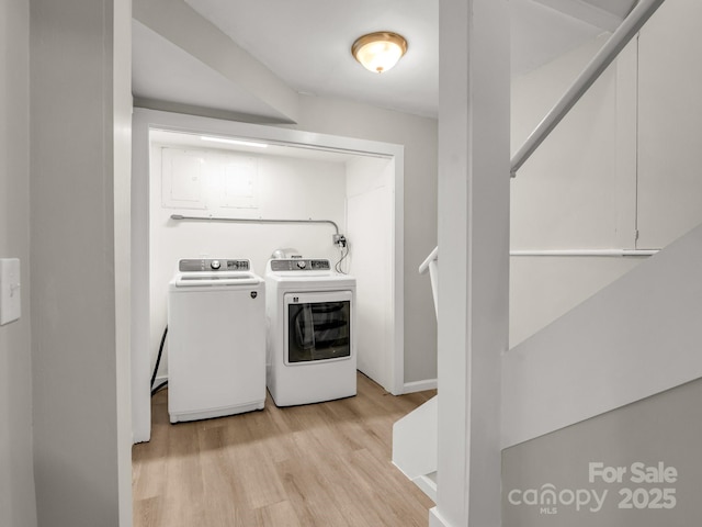 1463 Carolina Dr, Tryon, NC 28782 - washroom featuring light wood-type flooring and washing machine and clothes dryer
