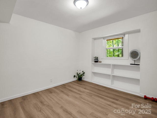 1463 Carolina Dr, Tryon, NC 28782 - unfurnished room featuring wood finished floors