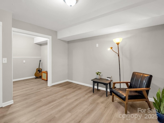1463 Carolina Dr, Tryon, NC 28782 - sitting room with light wood-style floors and baseboards