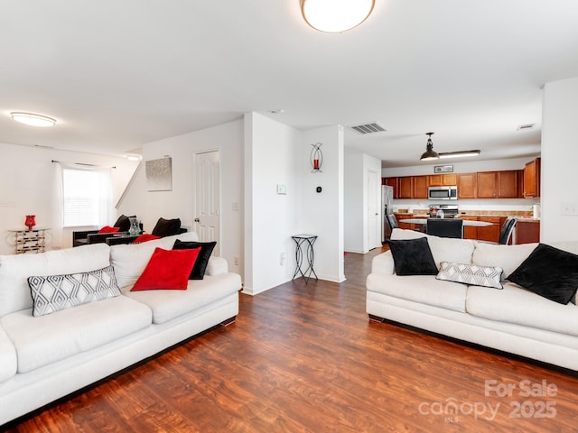 4316 Davis Meadows Dr, Charlotte, NC 28216 - living area with dark wood-type flooring and baseboards