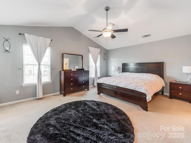 4316 Davis Meadows Dr, Charlotte, NC 28216 - carpeted bedroom featuring vaulted ceiling and a ceiling fan