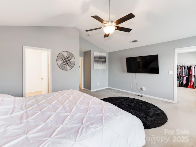 4316 Davis Meadows Dr, Charlotte, NC 28216 - bedroom featuring carpet floors, lofted ceiling, a walk in closet, ceiling fan, and a closet