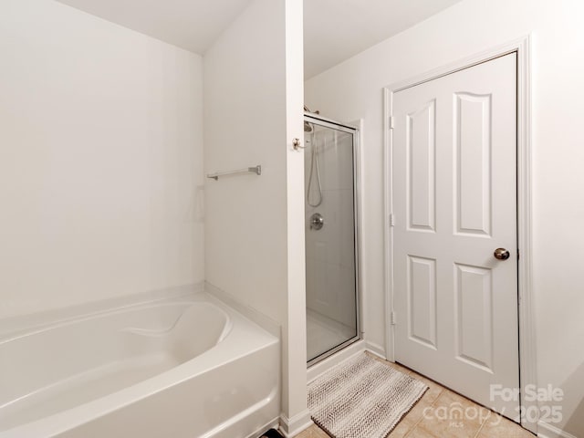 4316 Davis Meadows Dr, Charlotte, NC 28216 - full bathroom with tile patterned flooring, a stall shower, and a bath