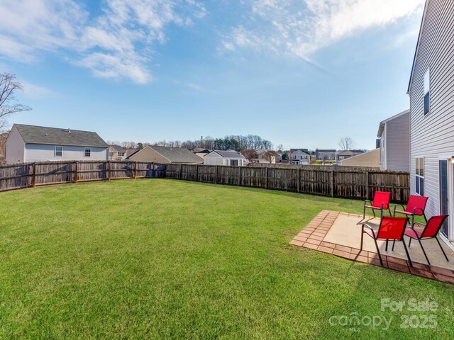 4316 Davis Meadows Dr, Charlotte, NC 28216 - fenced backyard with a residential view and a patio