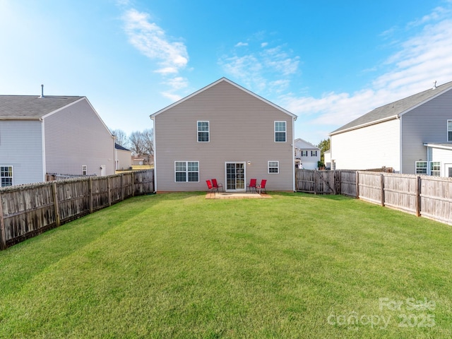 4316 Davis Meadows Dr, Charlotte, NC 28216 - back of property with a patio and a fenced backyard