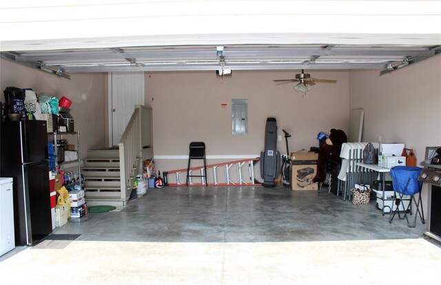 544 Tracy Grove Rd, Flat Rock, NC 28731 - garage featuring electric panel, freestanding refrigerator, and ceiling fan