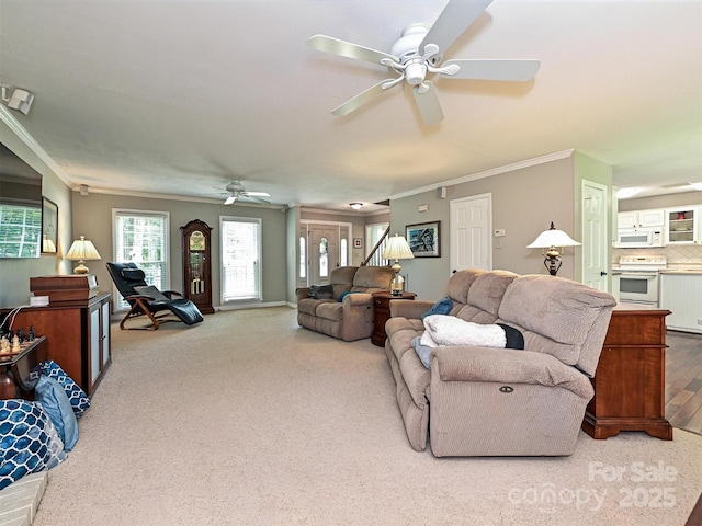 2621 Brightmoor Ridge Dr, Matthews, NC 28105 - living area with ceiling fan, crown molding, and carpet flooring