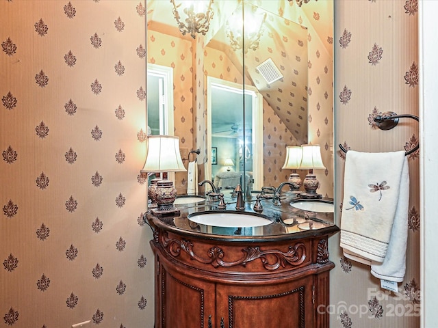 2621 Brightmoor Ridge Dr, Matthews, NC 28105 - bathroom featuring wallpapered walls and double vanity