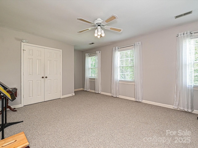 2621 Brightmoor Ridge Dr, Matthews, NC 28105 - unfurnished bedroom with carpet, a closet, and a ceiling fan