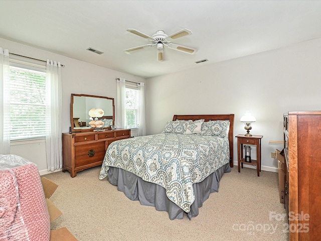 2621 Brightmoor Ridge Dr, Matthews, NC 28105 - bedroom featuring light carpet, multiple windows, and a ceiling fan