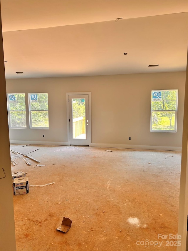3506 14th Ave SW, Hickory, NC 28602 - unfurnished room featuring carpet flooring and plenty of natural light