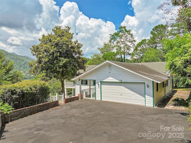 371 Clearview Dr, Waynesville, NC 28786 - view of front facade featuring a garage