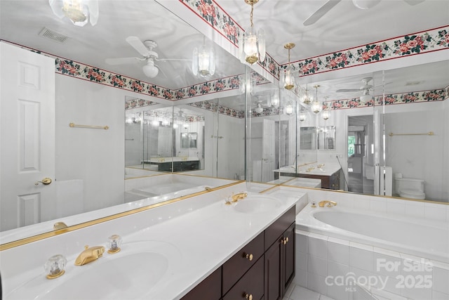 371 Clearview Dr, Waynesville, NC 28786 - full bath with a ceiling fan, a bath, and double vanity