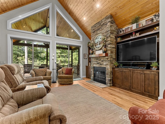 3094 Connestee Trl, Brevard, NC 28712 - living area with wooden ceiling, healthy amount of natural light, light wood-style flooring, a fireplace, and recessed lighting