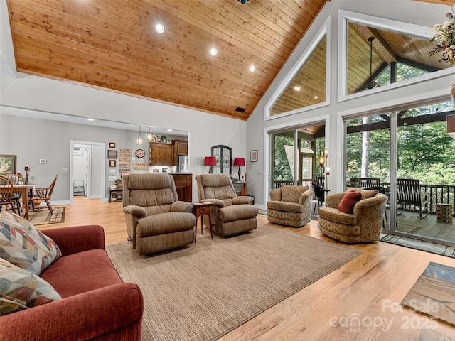 3094 Connestee Trl, Brevard, NC 28712 - living room with high vaulted ceiling, a wooden ceiling with exposed beams, light wood finished floors, recessed lighting, and plenty of natural light