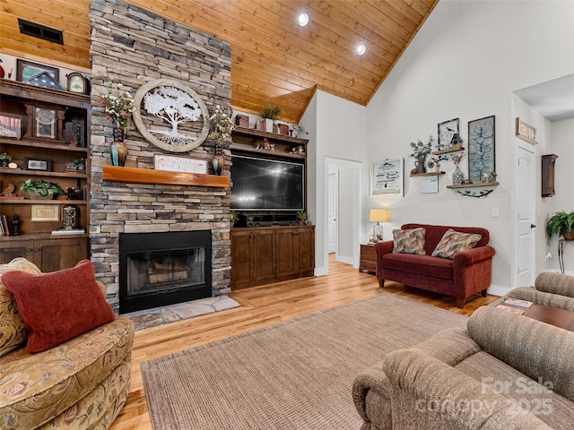 3094 Connestee Trl, Brevard, NC 28712 - living area with high vaulted ceiling, wood ceiling, wood finished floors, recessed lighting, and a fireplace