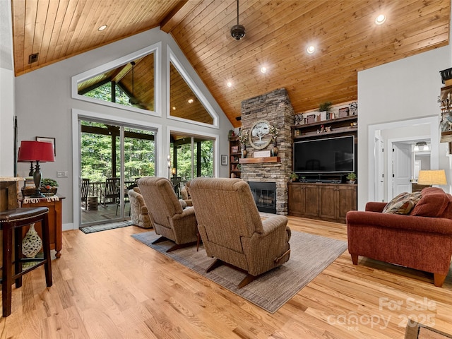 3094 Connestee Trl, Brevard, NC 28712 - living room with wood ceiling, light wood-style flooring, high vaulted ceiling, a fireplace, and recessed lighting