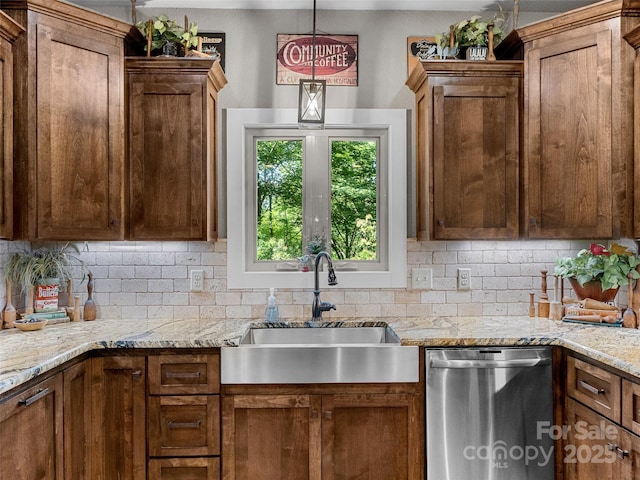 3094 Connestee Trl, Brevard, NC 28712 - kitchen with dishwasher, backsplash, light stone countertops, and decorative light fixtures