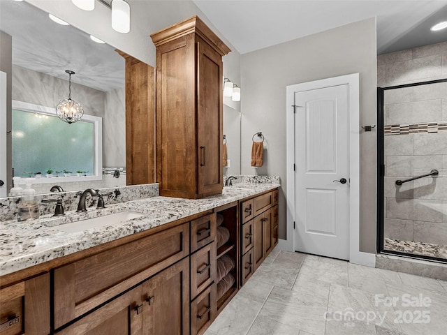 3094 Connestee Trl, Brevard, NC 28712 - full bathroom featuring double vanity, a shower stall, and a chandelier