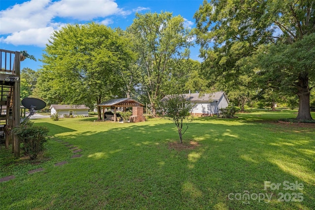 4534 Pebblebrook Cir SW, Concord, NC 28027 - view of green lawn with a gazebo and stairs