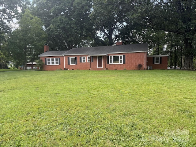 148 Barium Ln, Statesville, NC 28677 - ranch-style home with a chimney, a front lawn, and brick siding