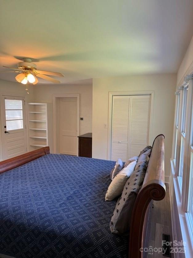 148 Barium Ln, Statesville, NC 28677 - bedroom featuring a closet, ceiling fan, and wood finished floors
