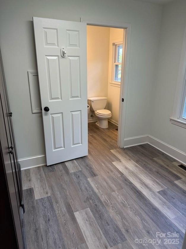 148 Barium Ln, Statesville, NC 28677 - bathroom featuring baseboards and wood finished floors