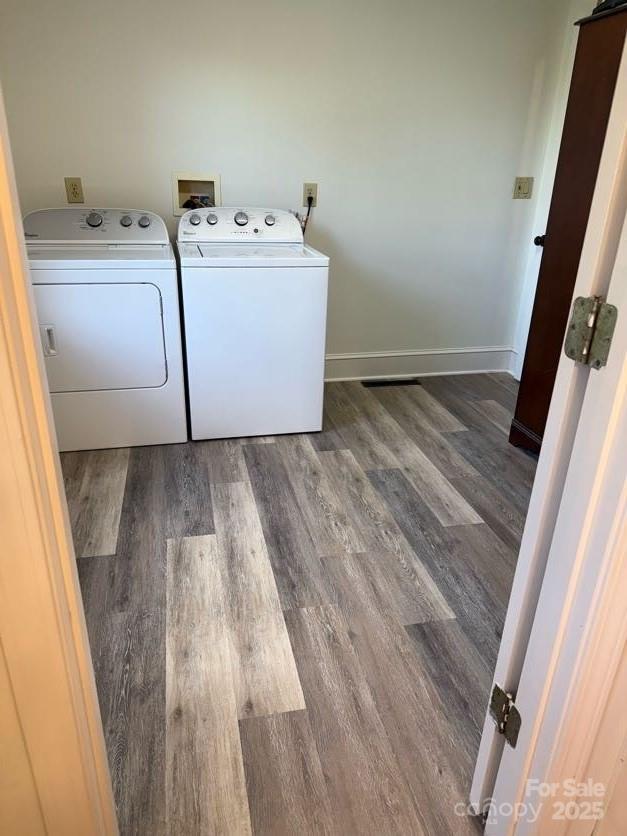 148 Barium Ln, Statesville, NC 28677 - washroom with washing machine and dryer and wood finished floors