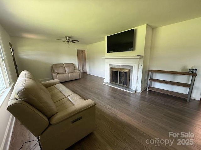148 Barium Ln, Statesville, NC 28677 - living room featuring dark wood finished floors, a fireplace, and ceiling fan