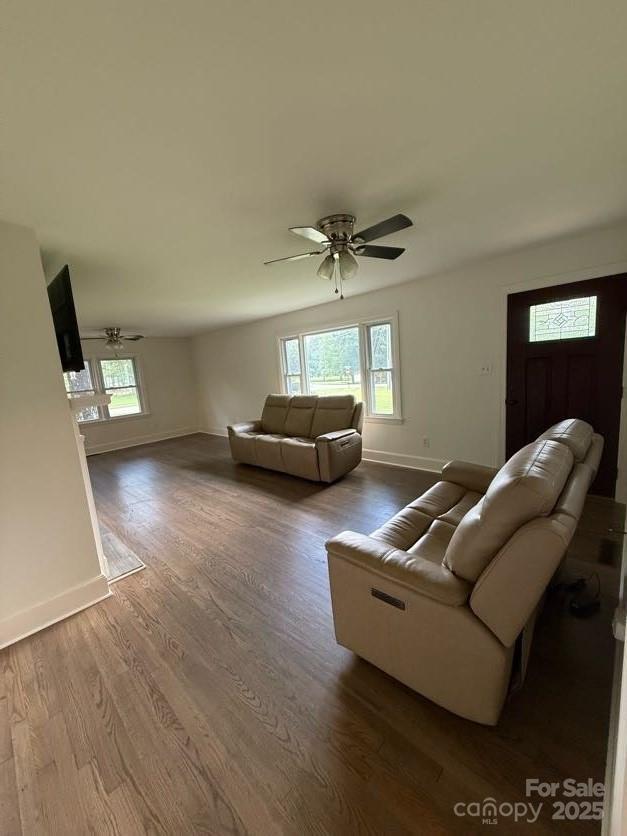 148 Barium Ln, Statesville, NC 28677 - living room featuring dark wood-style flooring and a ceiling fan