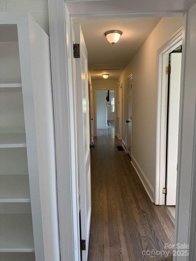 148 Barium Ln, Statesville, NC 28677 - corridor with dark wood-style flooring and baseboards