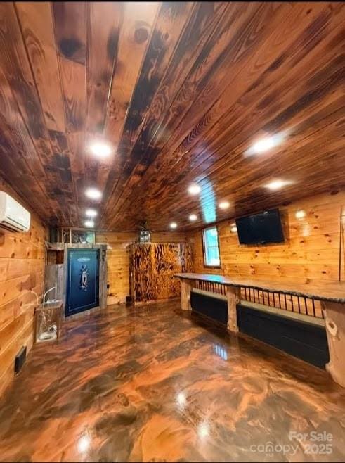 148 Barium Ln, Statesville, NC 28677 - basement featuring wooden ceiling, wooden walls, and a wall mounted air conditioner